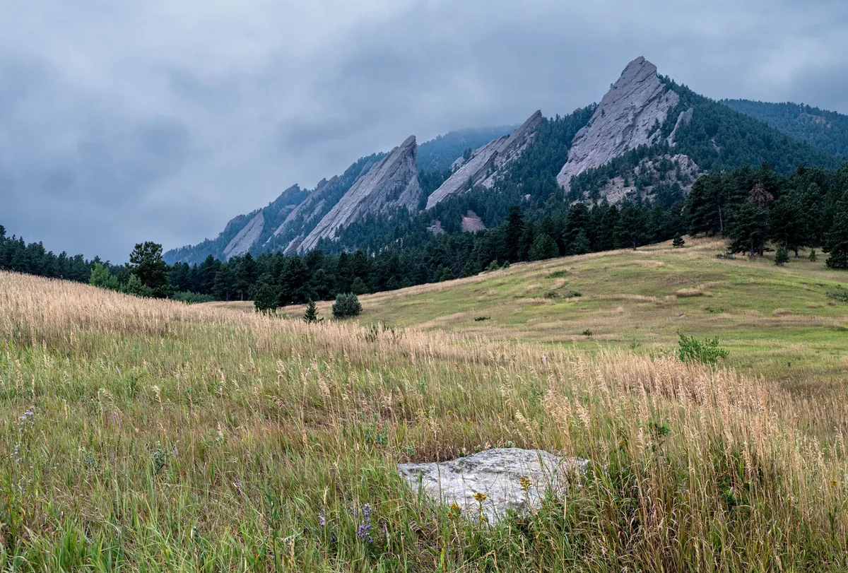 The Flatirons rock formations above Boulder, Colorado in summer