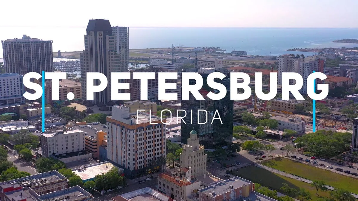 Aerial view of downtown St. Petersburg with Tampa Bay and the waterfront airport runway