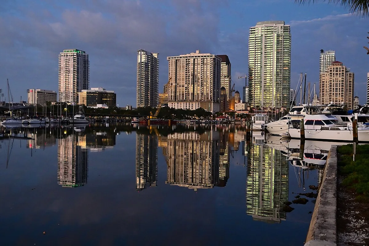 The downtown St. Petersburg, Florida skyline reflected in the marina at dawn