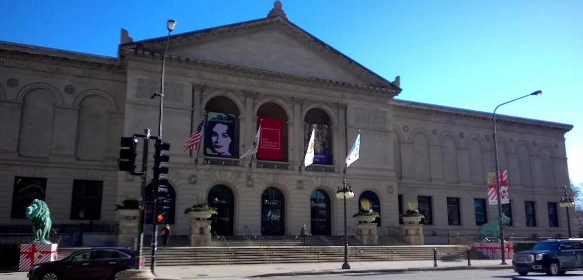 The Michigan Avenue facade of the Art Institute of Chicago, flanked by its two bronze lions