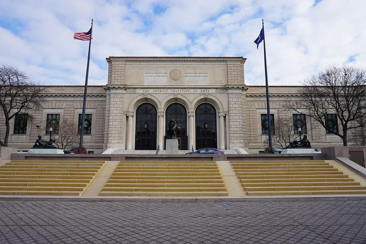 The Beaux-Arts facade of the Detroit Institute of Arts on Woodward Avenue, with Rodin's Thinker out front