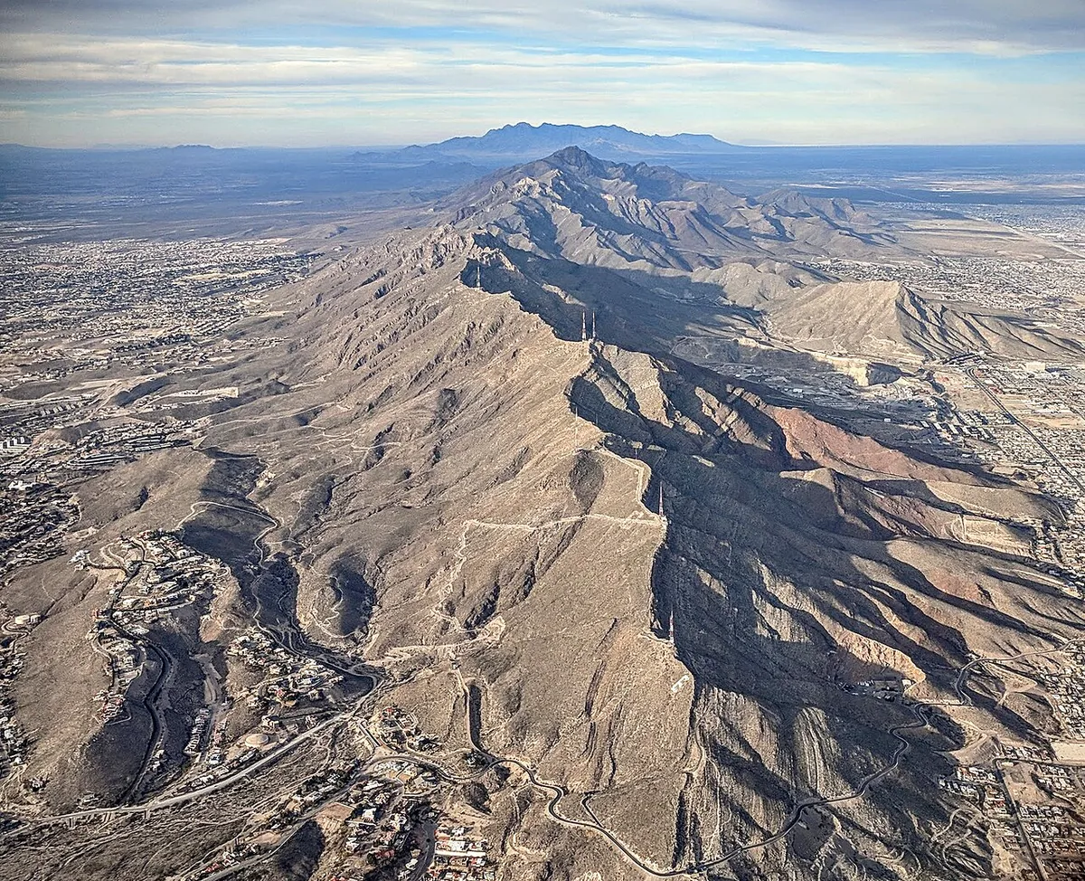 Aerial view of the Franklin Mountains range running through the middle of El Paso