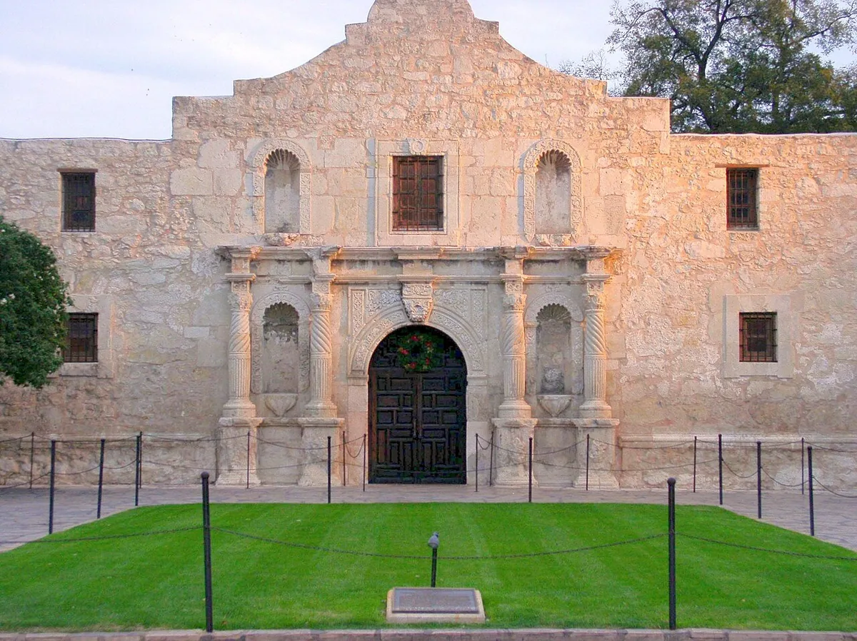 The stone facade of the Alamo mission church in downtown San Antonio
