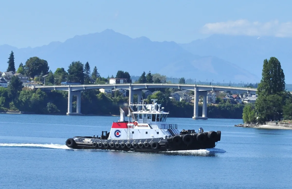 A tugboat on Sinclair Inlet with the Manette Bridge behind, Bremerton, Washington