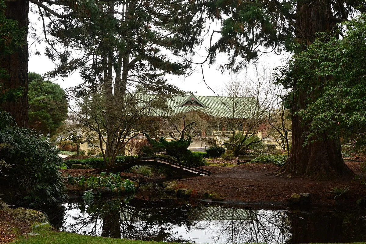 The pagoda and moon bridge over a pond in the Japanese Garden at Point Defiance Park, Tacoma