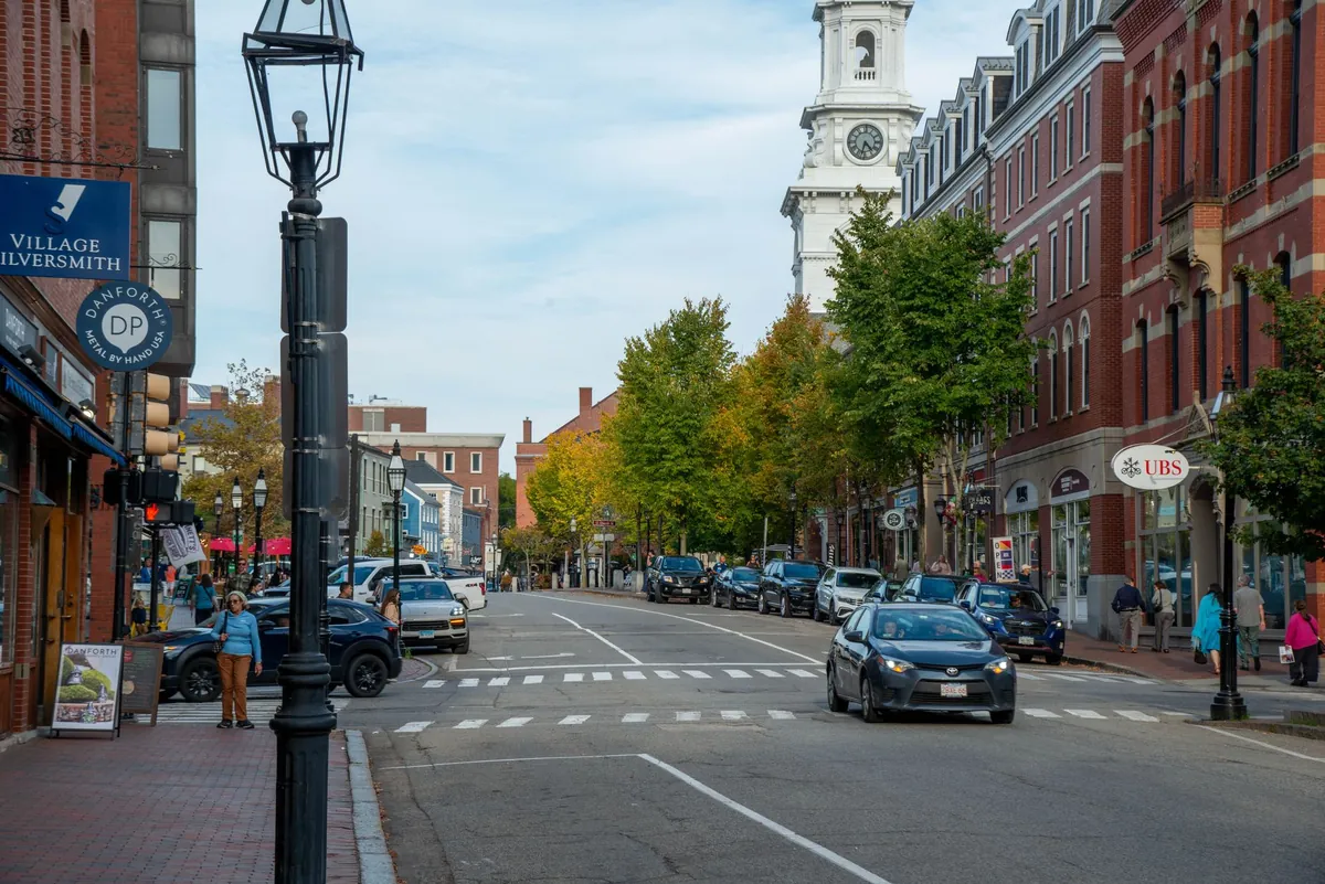 Street view of downtown Portsmouth, New Hampshire, with the North Church clock tower
